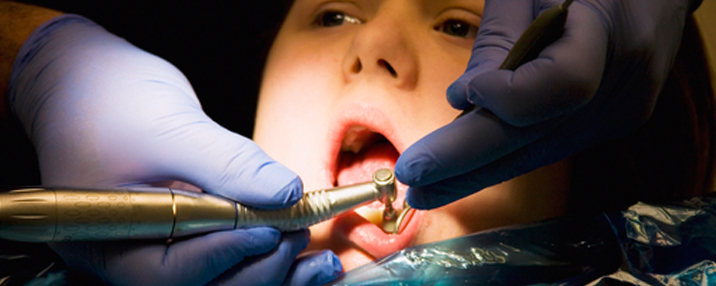 Young girl undergoes dental procedure