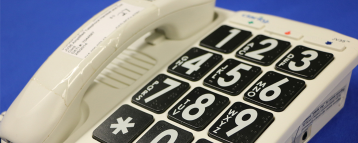 Phone with enlarged keypad