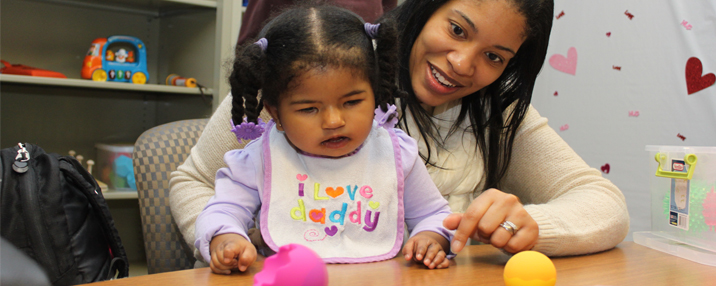 Mom and daughter enjoying sensory balls