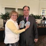 PAWS for People Executive Director Lynne Robinson, left, shares her excitement with Delaware Small Business Chamber founder and President Bob Older.