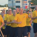 The Special Olympics Flame of Hope is carried along Route 1 in Rehoboth Beach