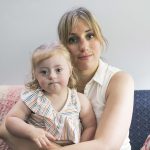 Celeste Blau holds her daughter, Clementine.