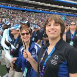 Special Olympics athlete Jillian Mathews waves a ribbon during the opening ceremony of the USA Games