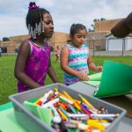 Layla Arthurs (left) and Jimena Gonzalez Coello do some drawing during the Friday water day