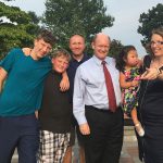 The Carrigg family poses with Delaware senator Chris Coons