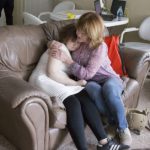 Shayne Nagel, right, comforts her daughter, Erin, who has autism Shayne Nagel, right, comforts her daughter, Erin, who has autism.
