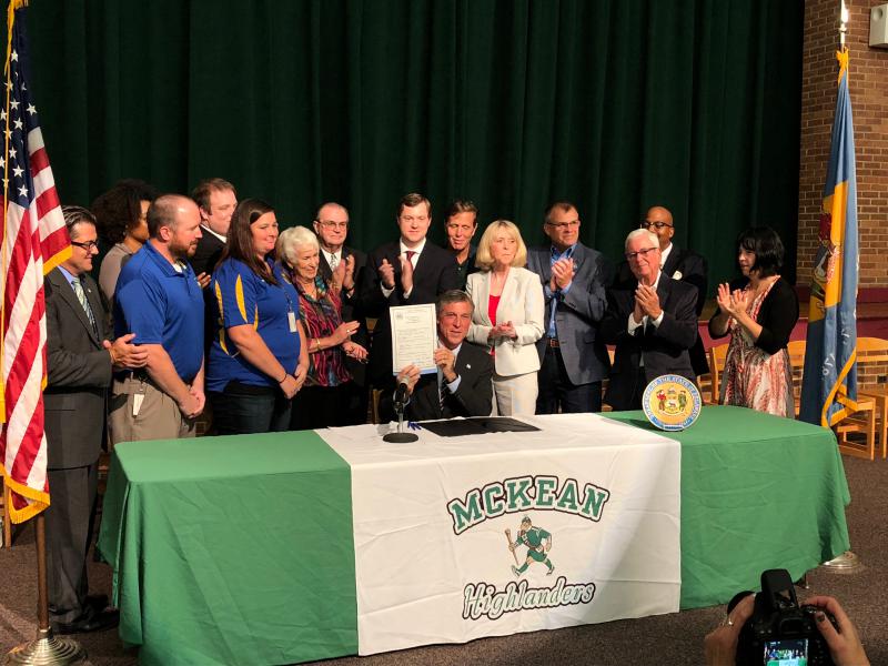 Governor John Carney signs bill at McKean High School in Wilmington