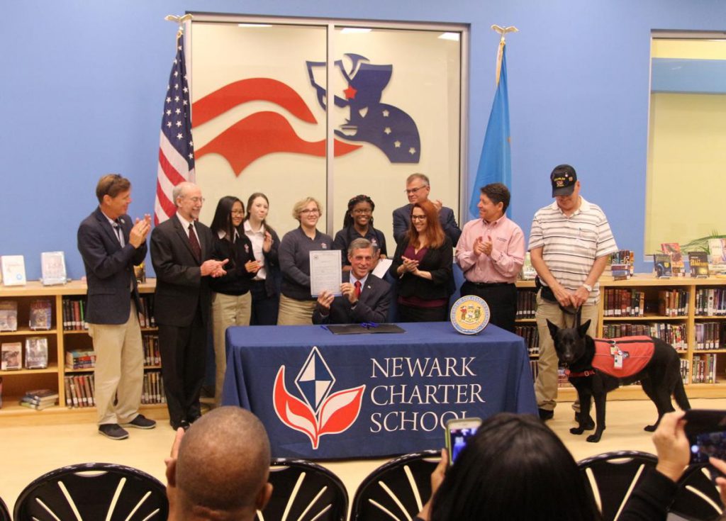 Governor John Carney signs a bill
