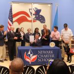 Governor John Carney signs a bill