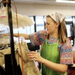 vocational rehabilitation program participant on the job at thrift store