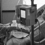 woman in hospital sick bed