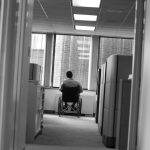 man in wheelchair in office