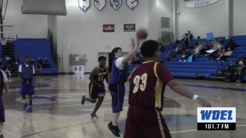 Dover's Lake Lindale makes a basket against Milford in a Unified Basketball game