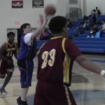 Dover's Lake Lindale makes a basket against Milford in a Unified Basketball game