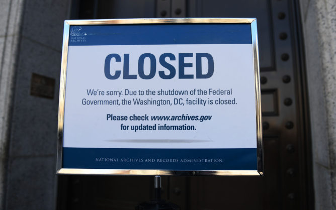 Sign announcing the closure of the National Archives due to a partial government shutdown