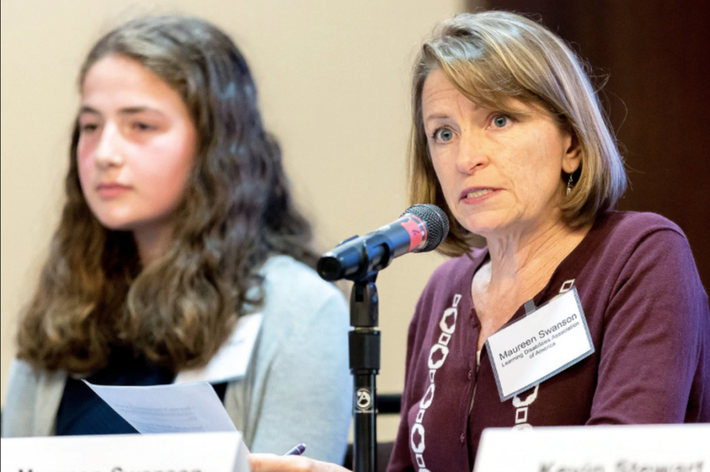 Maureen Swanson of the Learning Disabilities Association of America gives testimony at an EPA public hearing on its proposal to roll back clean car standards in Pittsburgh, 2018.