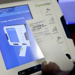 New voting machine that prints paper record of votes cast