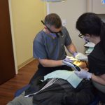 Dentis, assistant and patient