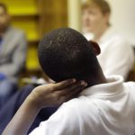 Black student in meeting with administration