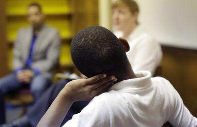 Black student in meeting with administration