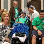 Senate Majority Leader Nicole Poore with friends during Cerebral Palsy Awareness Day.