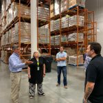 Governor John Carney of Delaware with representatives from and at the Food Bank of Delaware in Newark