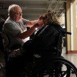 A patient being fitted for new glasses at a clinic in Knoxville, Tennessee