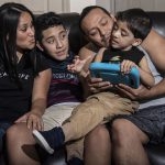 Velveth Roman Giron, left, and Pedro Marin Alvarez, with their children, Luis, 12, and Kevin, 5, at their home in Lancaster, Pennsylvania