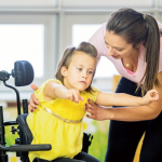 Caregiver with child with disability