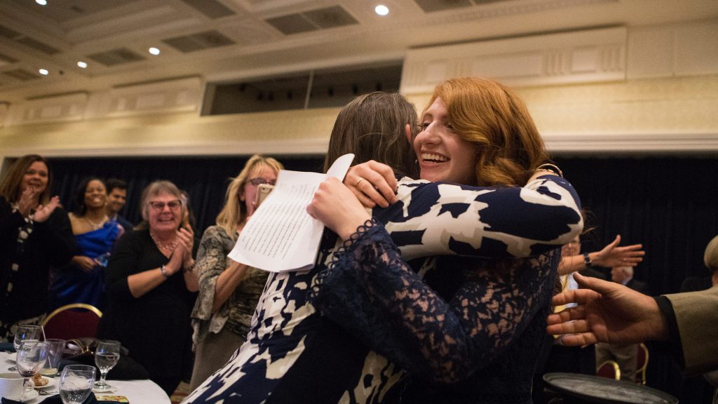 Fourth year special education teacher at the Colwyck Center Rebecca Vitelli receives hugs from colleagues and family after being named the Delaware Department of Education 2020 Teacher of the Year Tuesday night at Dover Downs Hotel & Casino.