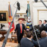 President Donald Trump participates in an event in the Oval Office