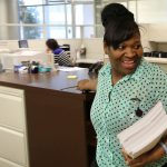 Shalonda Sanders, who has a disability, works the mailroom beat delivering letters, documents and packages to law office employees at Seyfarth Shaw in Chicago