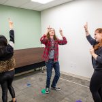 James Griffin dances with Wan-Chun Su and Brooke Tripp, graduate students at the University of Delaware working on a research study on autism and dance.