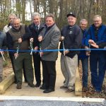 Cutting the ribbon for the Little Creek Wildlife Area boardwalk trail and wildlife-viewing tower east of Dover