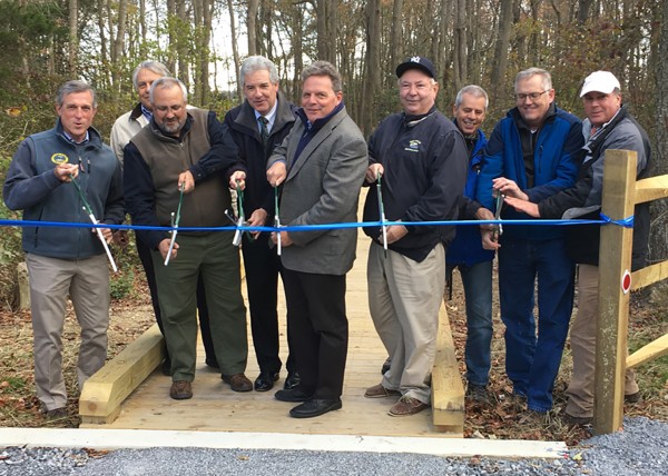 Cutting the ribbon for the Little Creek Wildlife Area boardwalk trail and wildlife-viewing tower east of Dover