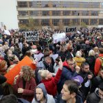 People attend a protest in Sarajevo, Bosnia, Thursday, Nov. 21, 2019.