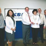 DFRC Executive Director Tony Glenn, far left, presents the foundations most recent donation to Kent-Sussex Industries Inc., with Ann Haggerty, KSI supported employment manager; B. Craig Crouch, KSI CEO; Marty McDonough, of DFRC; Jayson Crouch, KSI vice president; and Jim Greenwell, KSI comptroller.