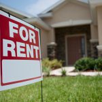 House with For Rent sign out front