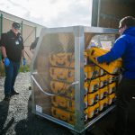 Staff of the Yakima Valley Office of Emergency Management evaluate a weekly supply shipment