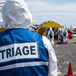 man in outdoor triage area