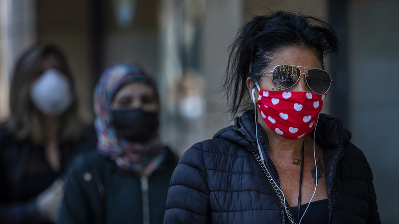 People on the street wearing face masks