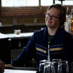 A still of a from the television show Stumptown featuring Cole Sibus an actor who has Down syndrome