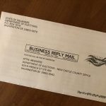 An envelope containing a Delaware absentee voter application