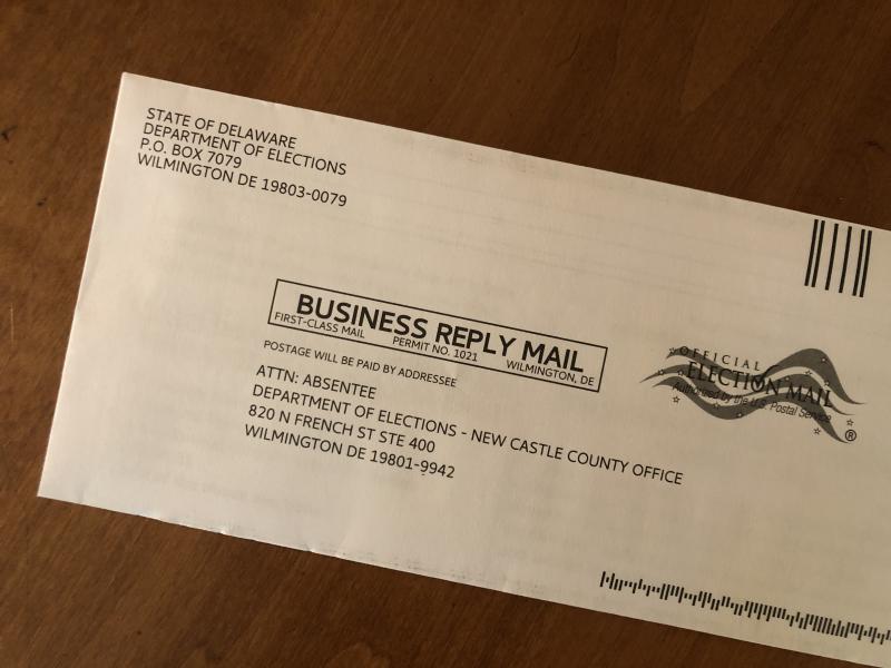 An envelope containing a Delaware absentee voter application