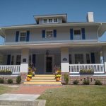 A two-story house with a well-tended lawn in Newark