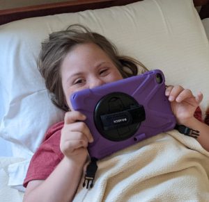 Anna with purple iPad case