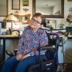 Martha Chambers, seen here at her home in Milwaukee, Wis., is seated in a motorized wheelchair