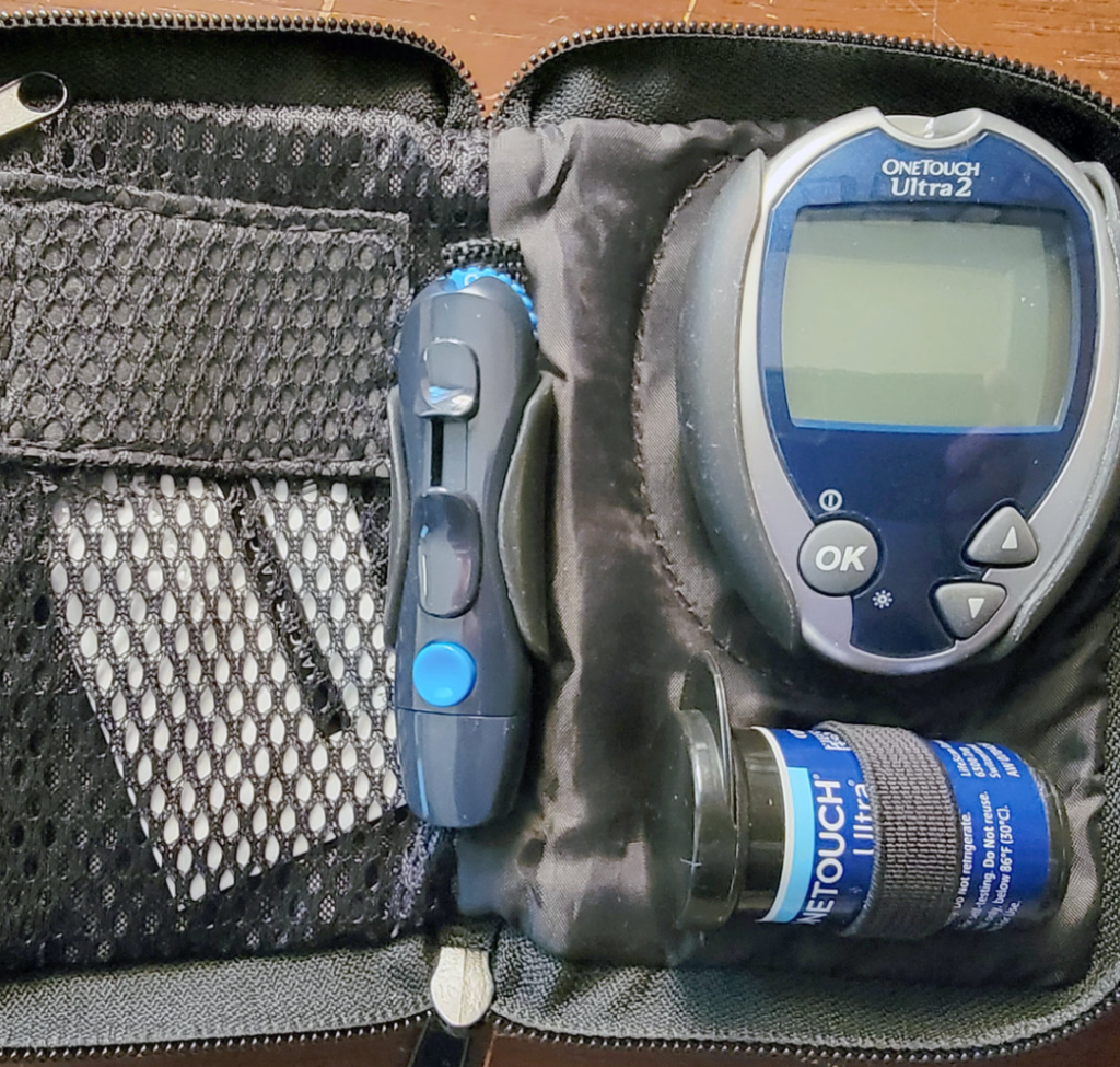 A glucose meter in a pack