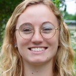 J_godfrey-crop Jayla Godfrey has wavy blond hair and wears round, wire-framed glasses.