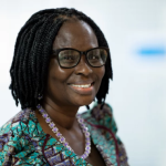 Gertrude Oforiwa Fefoame has chin-length hair in braids and dark-toned skin.